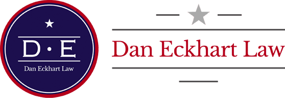 A red and black logo for dan eckert